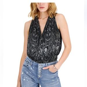 Beautiful surplus top. Fun and trendy!